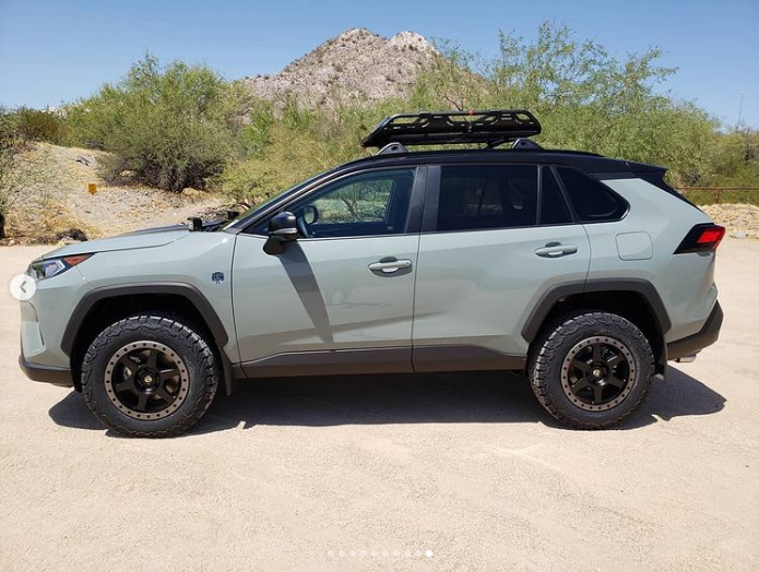 lifted lunar rock rav4 with offroad modifications