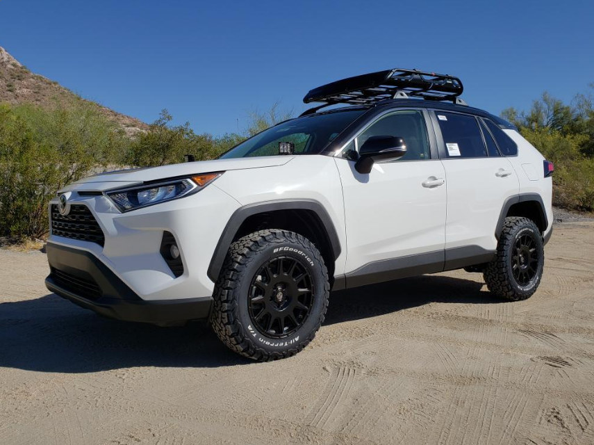 lifted white rav4 with offroad tires