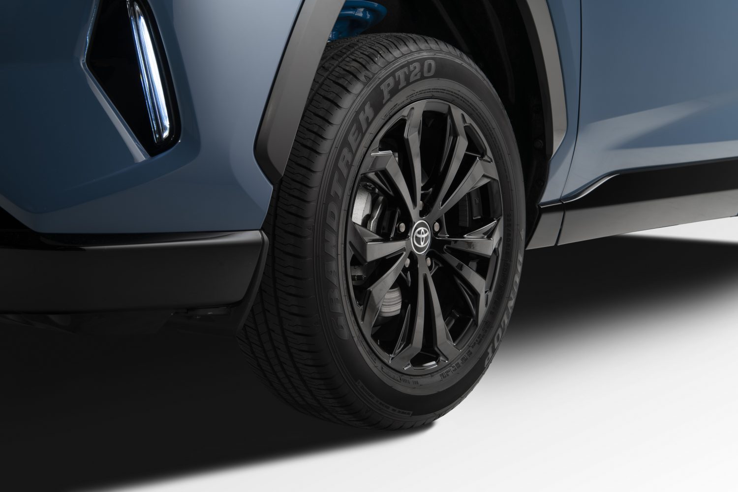 rav4 in cavalry blue front left wheel area close up