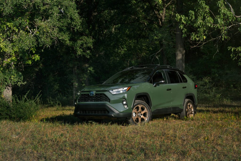 army green toyota rav4 front left view