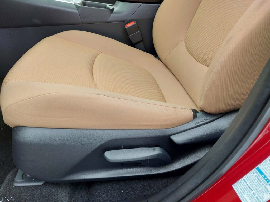 nutmeg fabric drivers seat close up